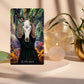 Tarot card titled 'The Devil' with a person holding a skull, surrounded by mystical elements.