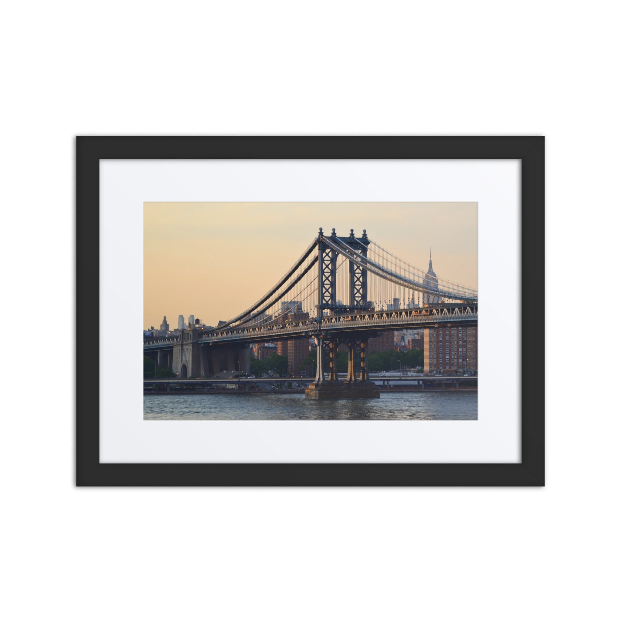Framed photograph of a bridge with a white border and black frame.
