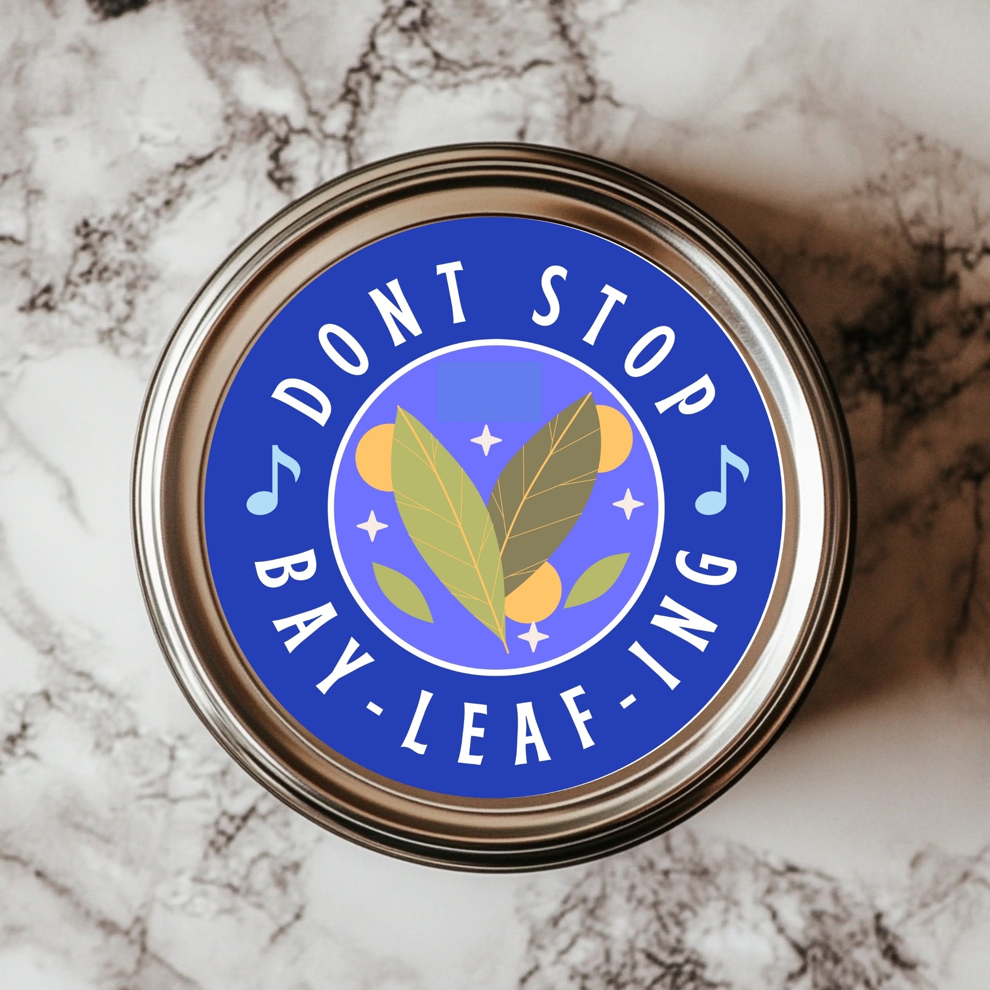 A round sticker with a blue background featuring the text 'DON'T STOP BAY-LEAF-ING' and an illustration of a bay leaf and musical notes.