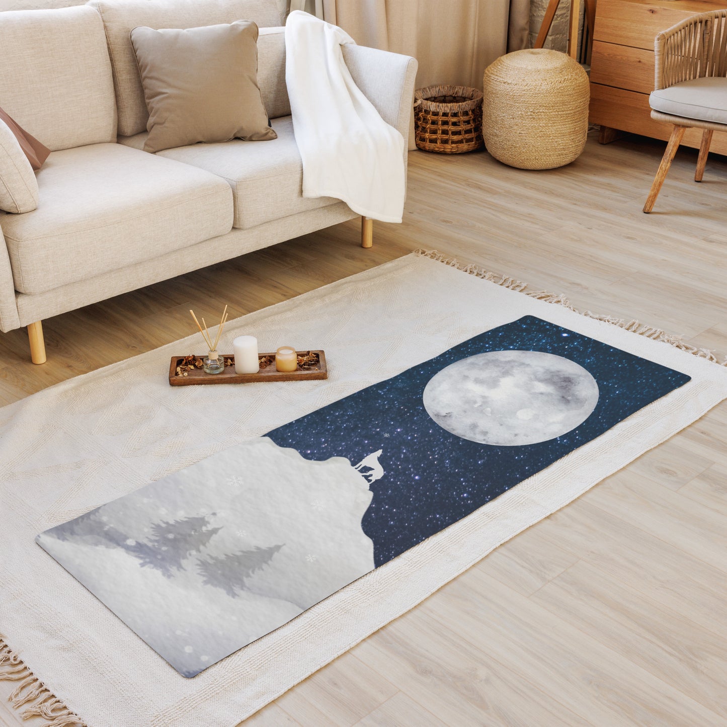 Howling moon yoga mat featuring a wolf silhouette on a snowy hill beneath a full moon in a starry night sky.