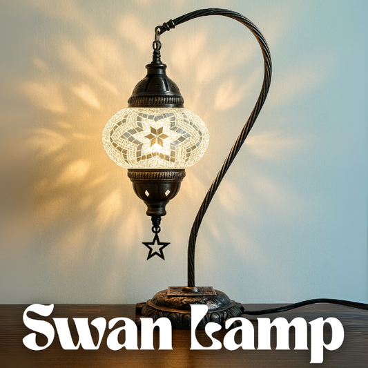 Decorative lamp with intricate design on a wooden surface, branded 'Swan Lamp'.