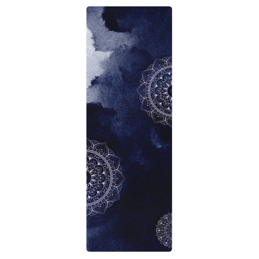 Zen mandala yoga mat featuring a detailed white mandala pattern on a deep blue textured background.
