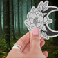Flat lay of the Lunar Garden Waterproof Vinyl Sticker, displaying a sophisticated crescent moon and floral theme, perfect as a stylish crescent moon sticker for decorating.
