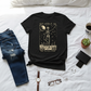 T-shirt flatlay on bed